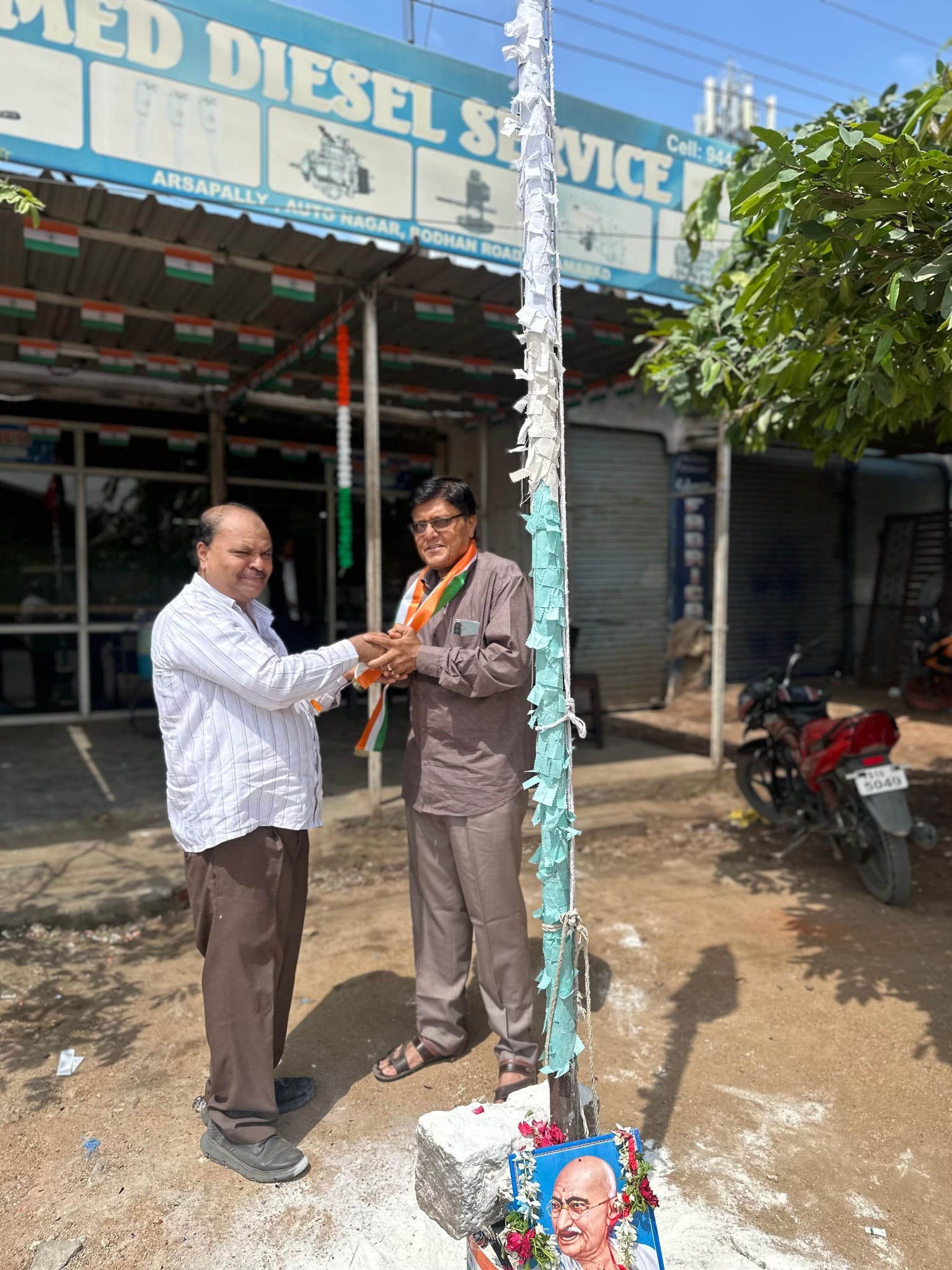 Owner of Ahmed Diesel Service outside the workshop in Nizamabad